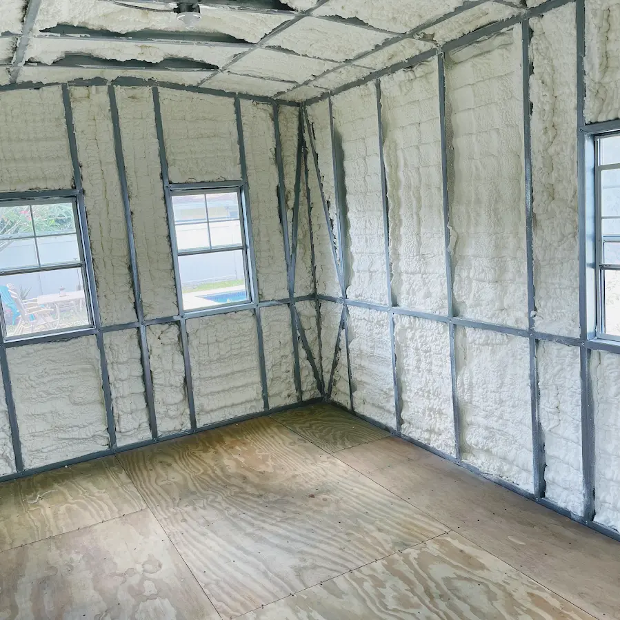 Closed-cell spray foam insulation applied to wall cavities in a residential project in Ridgefield